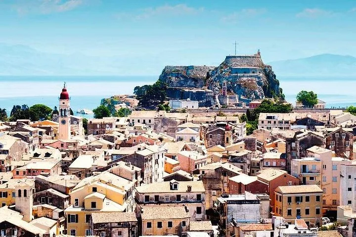 Panoramic view of a picturesque town with historic buildings and a fortress