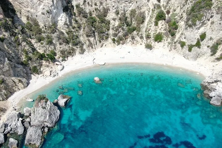 High angle shot of a secluded beach with crystal clear turquoise water